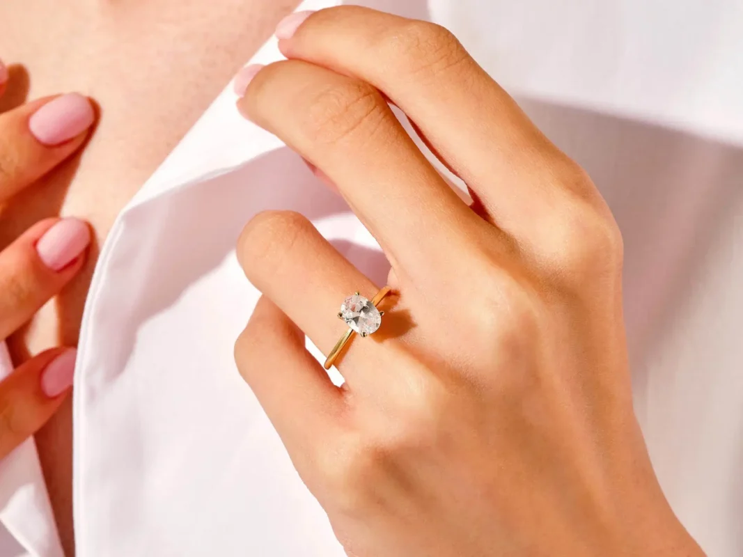 The luster and fire of moissanites are more brilliant than that of natural diamonds. The sleek ring band shows its unique warmth and romance, creating a timeless and eye-catching look. This oval moissanite engagement ring is perfect as a piece of everyday jewelry. Its simple yet elegant style makes it easy to stack with other rings, or you can wear it only to show its minimalist design and your unique elegance. Whether as an engagement ring or for daily wear, this oval moissanite ring is always an ideal choice!